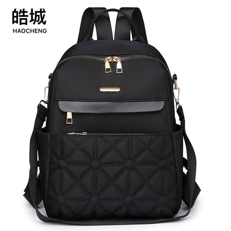 Mochila de mujer de nylon de nuevo estilo al por mayor transfronteriza 2024 Mochila multifuncional de viaje al aire libre de todo fósforo de moda Mochila escolar