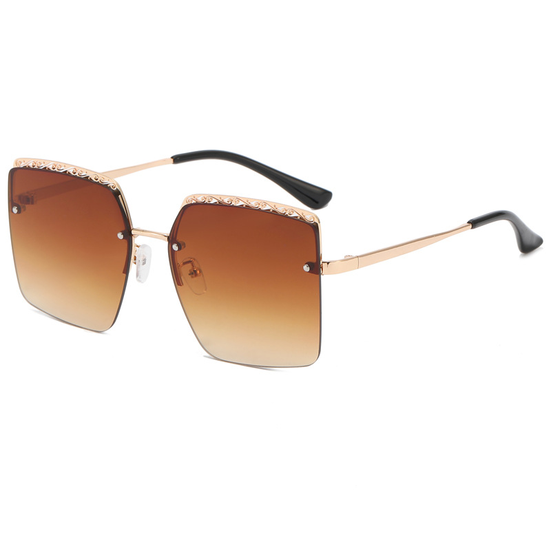 Primavera de fábrica nueva Europa y América transfronteriza Sun Festival frameless recort-out metal gafas de sol personalizadas