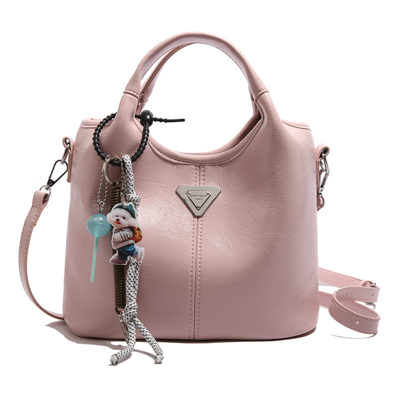 Bolsa de cubo de mano explosiva de comercio exterior para mujeres 2025 nueva moda bolsa de hombro ocio para viajar al trabajo de alta calidad bolsa madre