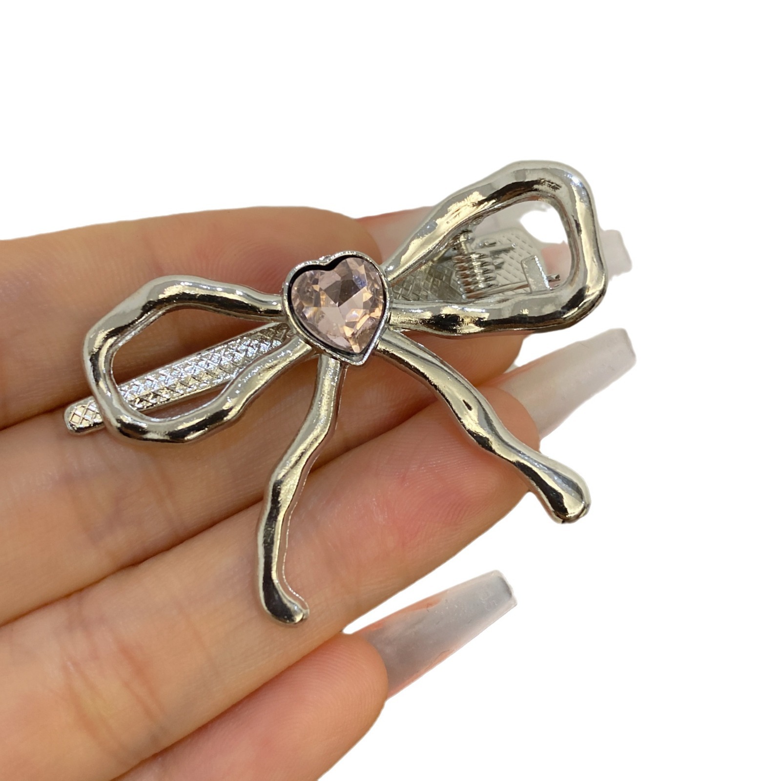 Fermaglio a fiocco in argento con strass per capelli da donna_voghion.com