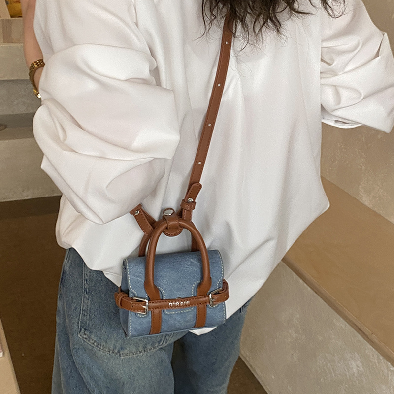Moda coreana de patrón de leopardo, bolso de hombro para niños y niñas, bolso mini para niños con letras extranjeras, bolso de accesorios para niños.