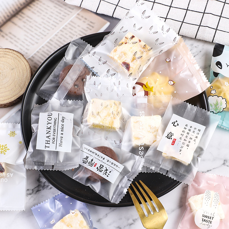 Frosted copo de nieve crujiente bolsa de embalaje hornear postre galleta pequeña bolsa de galletas dulces leche Jujube beef biscuit machine Seal bolsa