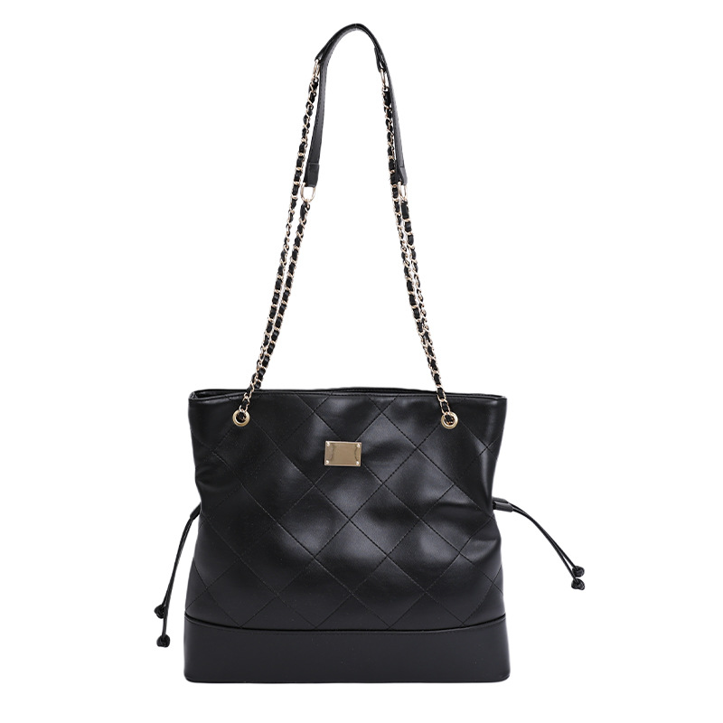 Bolsa de cadena de diamante transfronteriza retro bolso de cubo de agua mujer otoño y invierno 2025 nuevo empalme mochila de hombro de viaje