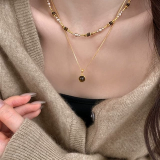 美拉德虎眼石吊坠项链女款轻奢高级感毛衣链复古新款独特百搭项饰