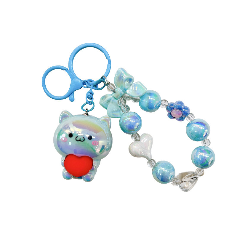 Galvanoplastia abrazo amor oso con cuentas llavero colgante acrílico muñeca colgante garra máquina muñeca regalo al por mayor