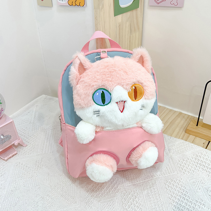 Nueva mochila de dibujos animados para niños tendencia pupila diferente gato muñeca mochila desmontable jardín de infantes en stock