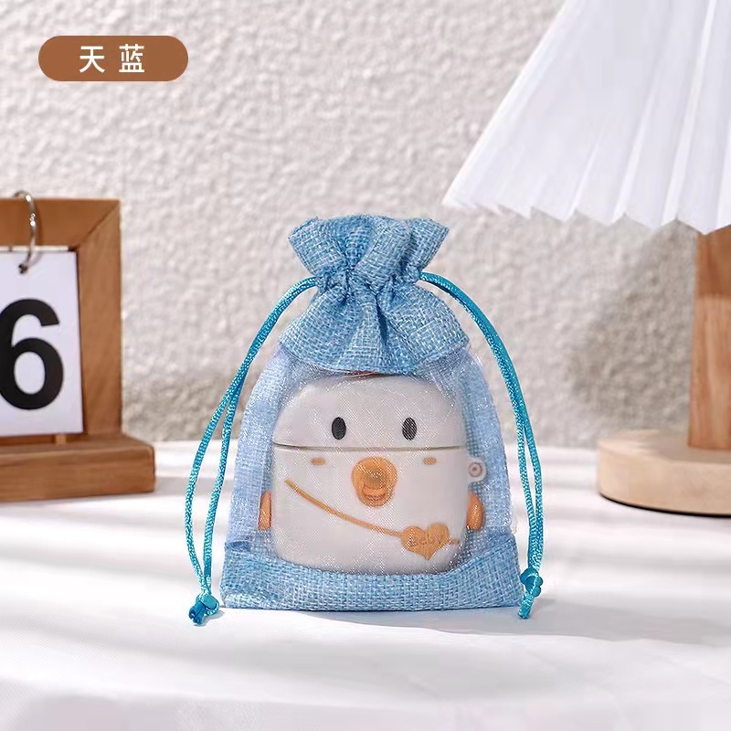 国境を越えて卸売りして麻布の袋のクリスマスの麻の袋をまねて縄を引いて袋のクリスマスの贈り物の袋を縛って注文します。|undefined