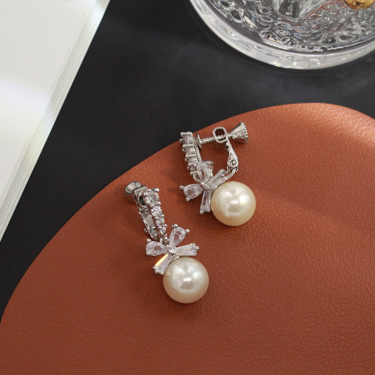 Retro small design fashionable elegant earrings with bow pearl with…