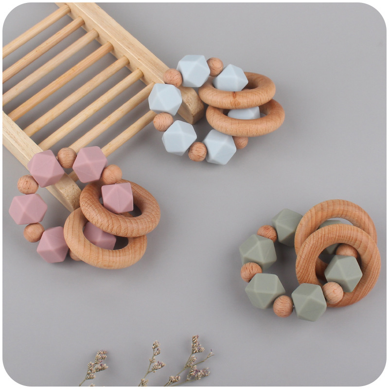 Nuevos suministros para bebés Beech teether pulsera bebé creativo silicona mordedura gel molar juguete AliExpress Nuevo