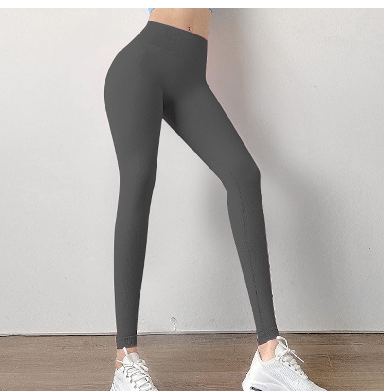 pantalones de yoga de color sólido de cintura alta de alta elasticidad sin costuras que levantan la cadera NSYWH139365