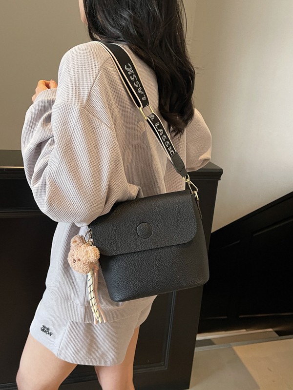 Bolso de balde para mujeres 2025 nuevo cross-border lichi estampado bolso de hombro de textura alta ancha doble correa de hombro mochila