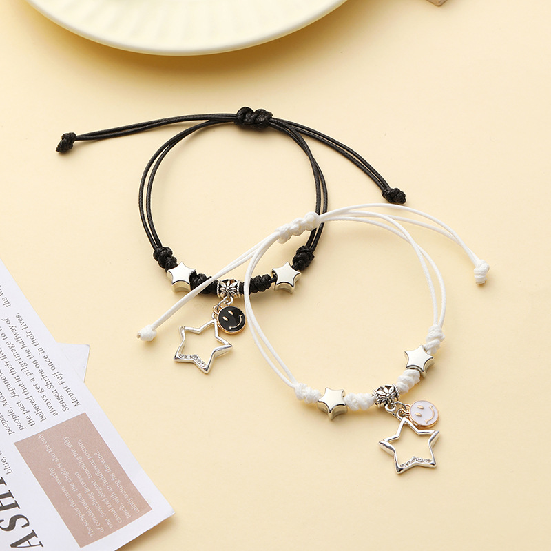 Pulsera pareja corazón hueco trenzada ajustable blanco negro_voghion.com