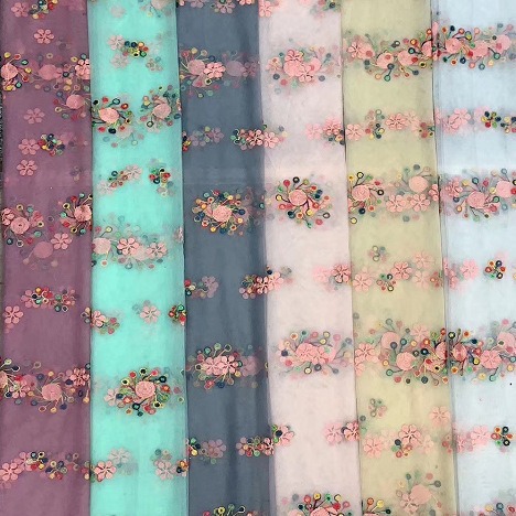 厂家直销 新款绣花布料 拍照童装 蕾丝面料 花边刺绣 风车轮花绣