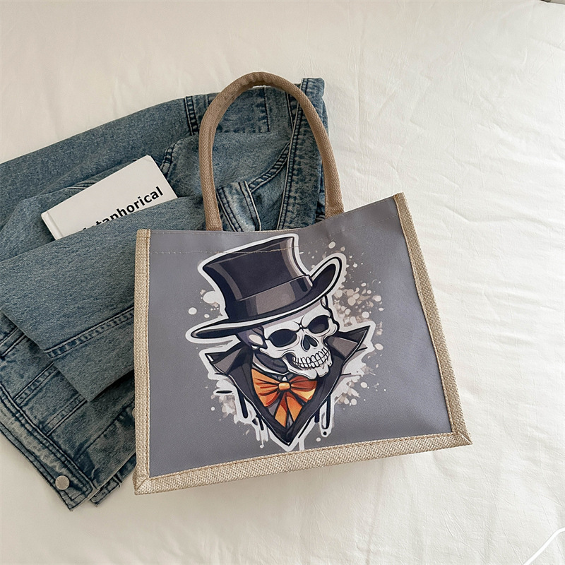 Nueva bolsa de lona de calaveras, bolsa de mano de gran capacidad para mujeres, bolsa de hombro para clases, moda 2024