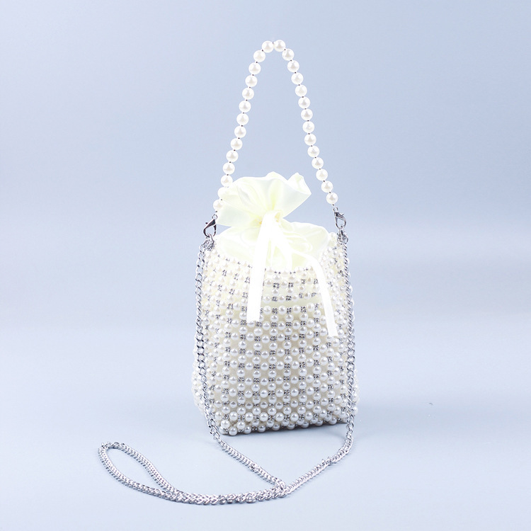 Explosive small 8 PCT imitation pearl Stitching small silver beads hand-held chain multi-use handmade beaded woven bag Explosive small 8 PCT imitation pearl Stitching small silver beads hand-held chain multi-use handmade beaded woven bag