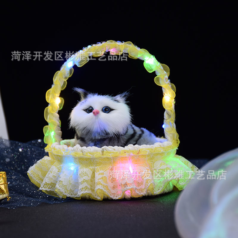 Cestas luminosas con lámparas y llamadas gatitos, simulación de gatos, juguetes luminosos para niños, estandos, puntos de venta.