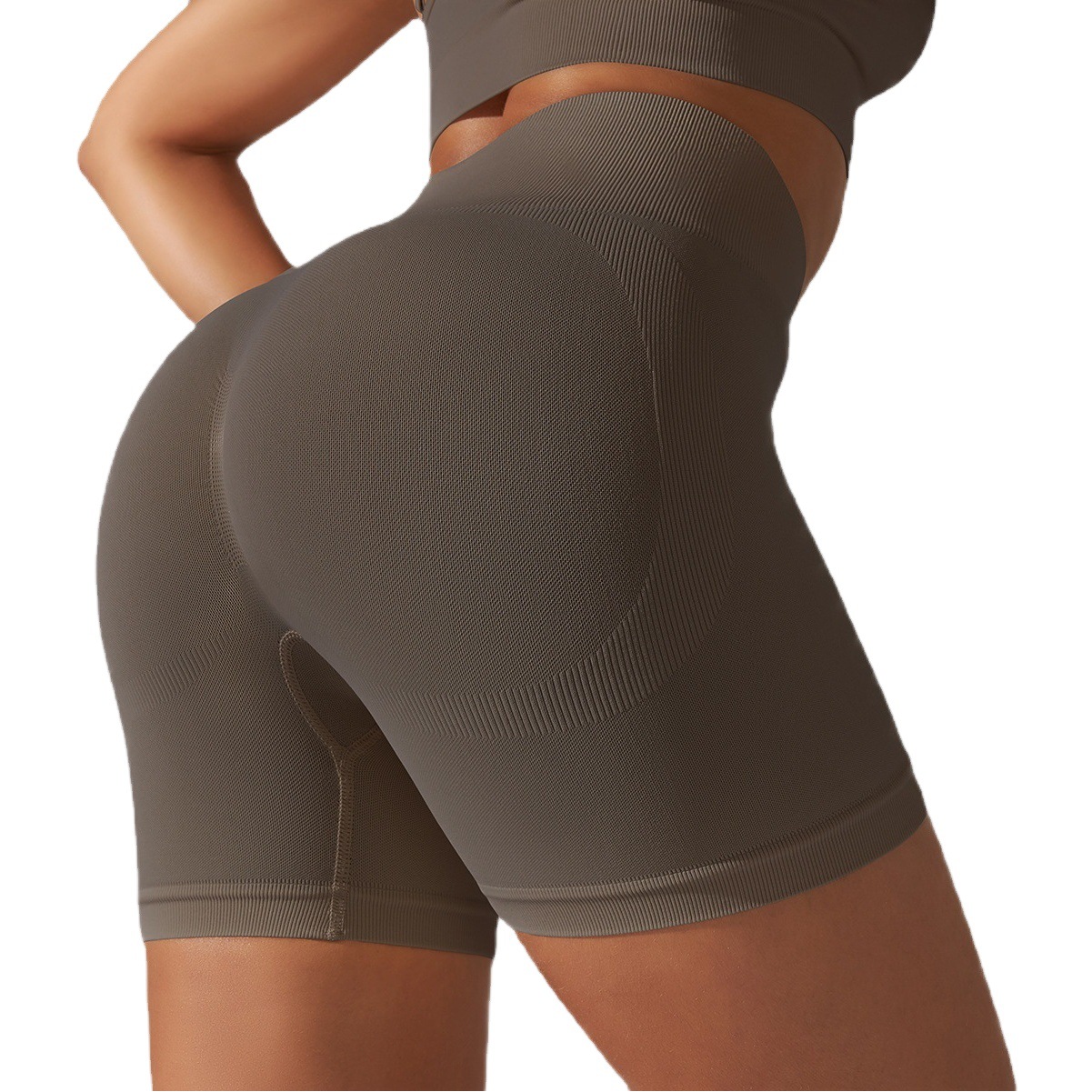 Transfronterizo sin costuras apretado color sólido melocotón Levantamiento de cadera cintura alta cuerpo que forma pantalones cortos de yoga deportes correr fitness tres pantalones para mujeres