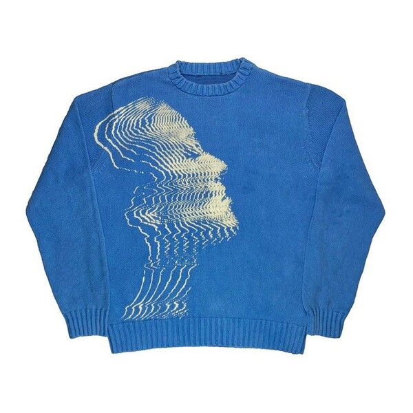 Elegant demi-season knitted sweater with a round collar