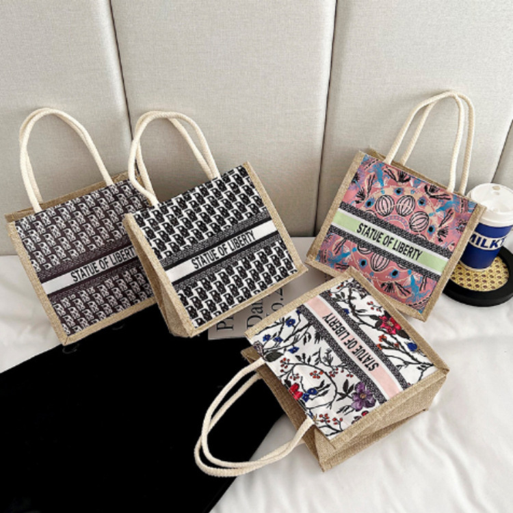 Bolsa de mano de estudiantes coreanos de moda femenina, bolsas de arroz de lino de nuevo estilo japonés OL bolsa de almuerzo de lona