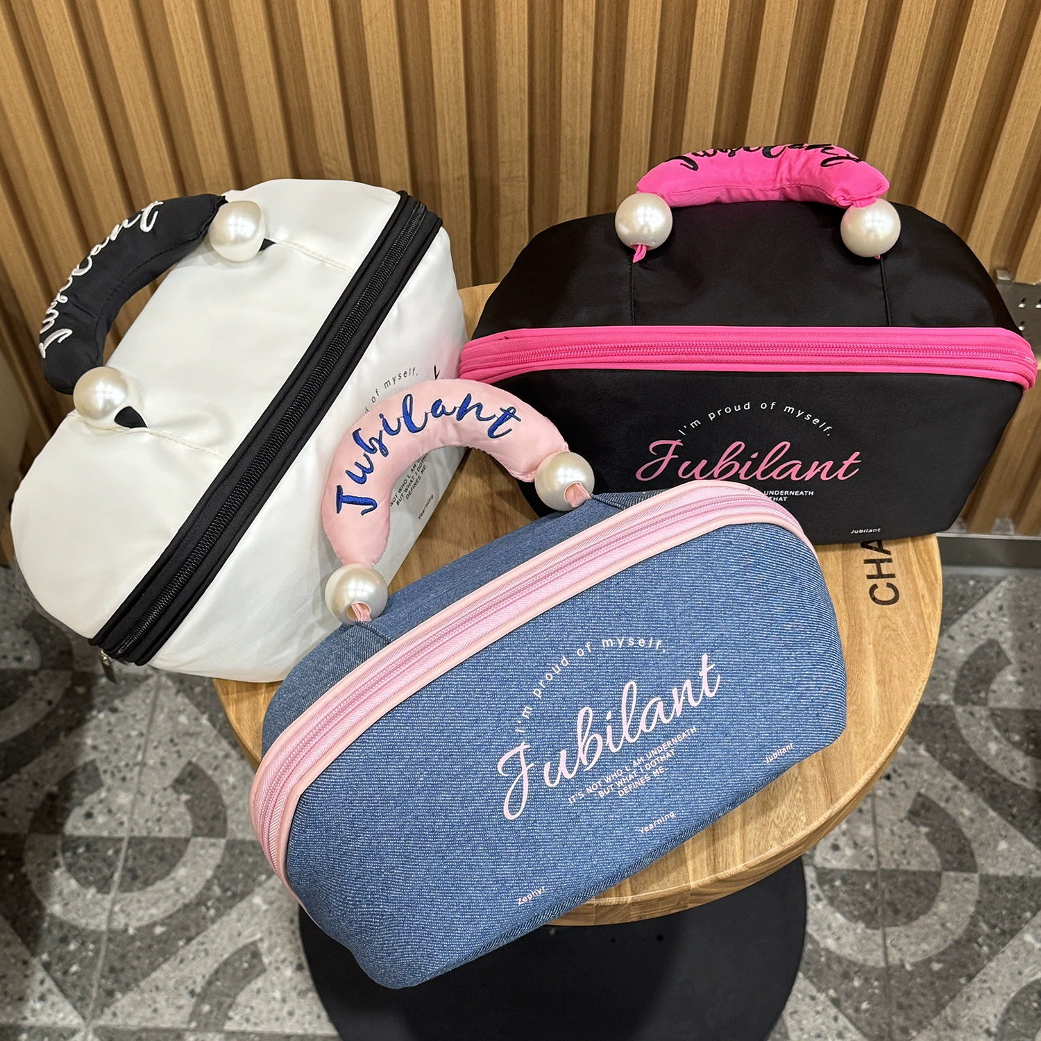 Handheld brand cosmetic bag, capacious storage system for traveling