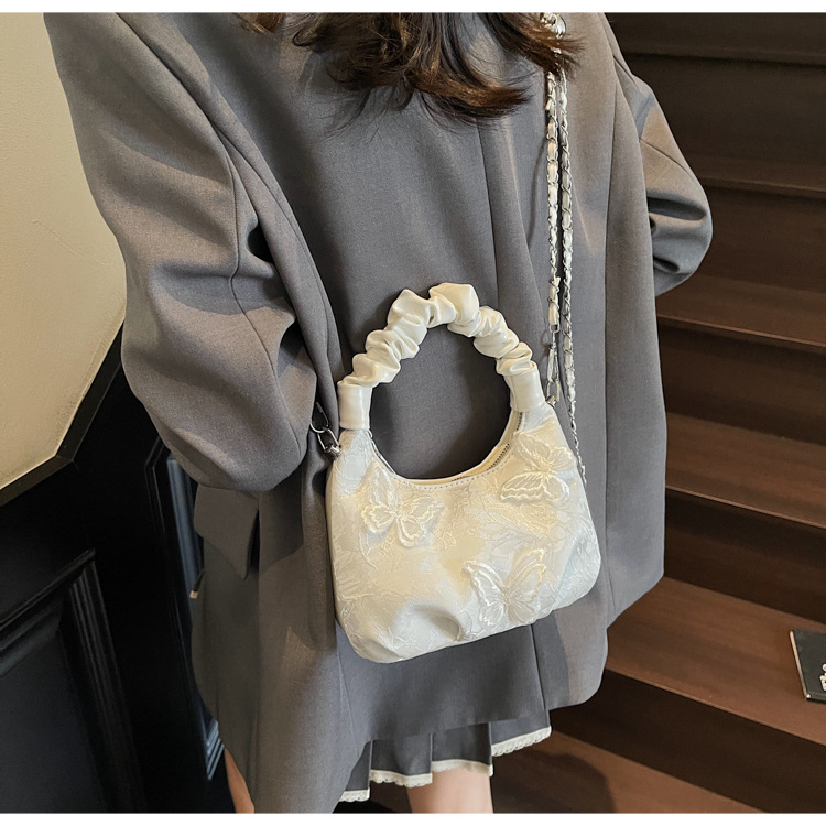 New Chinese-style embroidered bag for women, 2025 new summer commuting crossbody bag, niche ancient-style hand-held bucket bag undefined