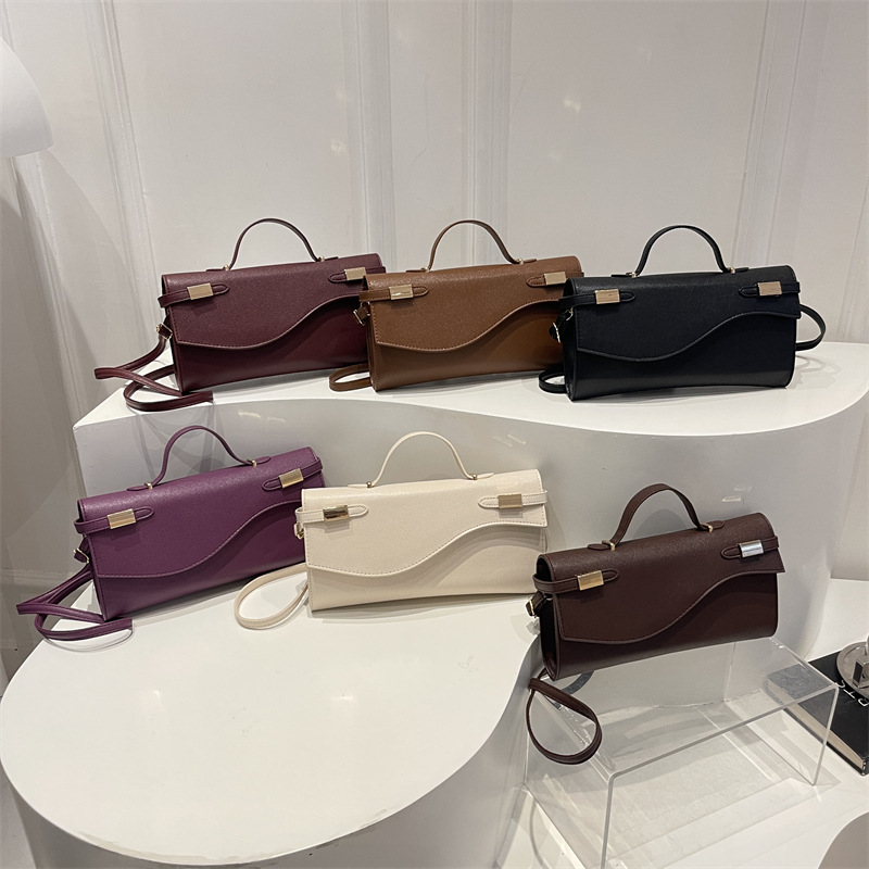 Cross-border trendy niche small square handbag for women, 2026 summer new model, solid color textured shoulder bag, commuter crossbody bag