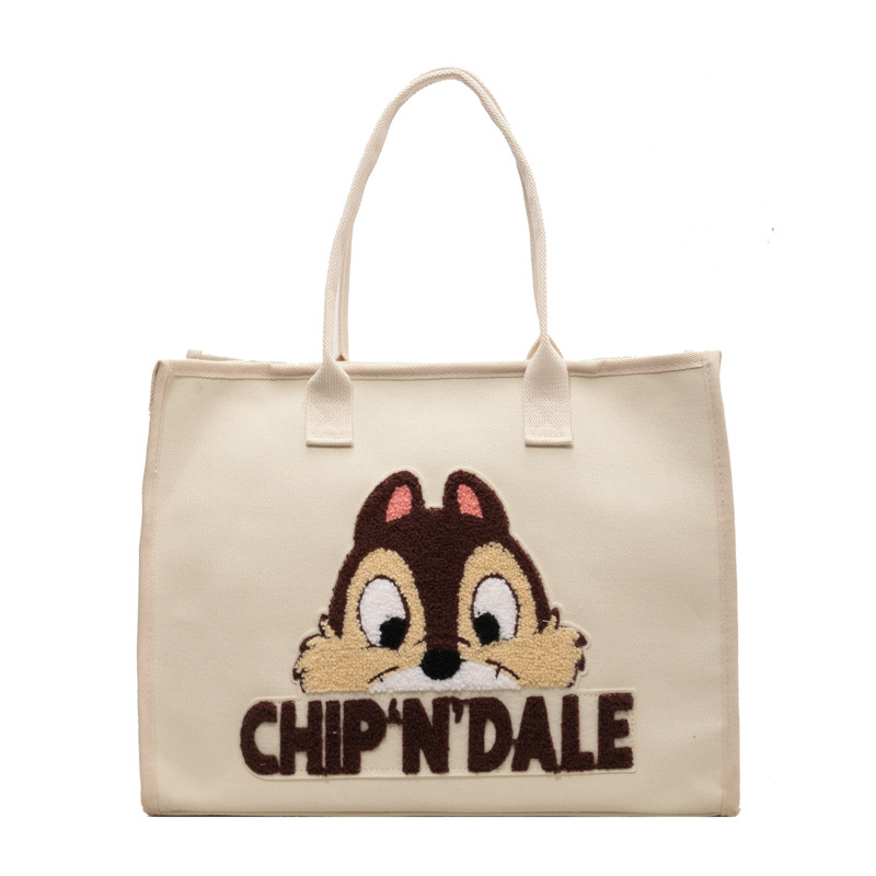Bolsa de lona de gran capacidad para mujeres 2025 nuevo estilo urbano minimalista de moda de dibujos animados portátil de hombro para viajar bolsa
