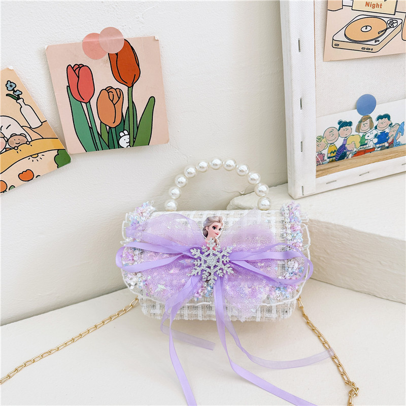 2024 nuevo bolso de moda para niños princesa perla bolso de cambio de mano cadena de chicas bolso de hombro