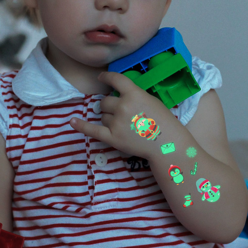 Wholesale cross-border cartoon Christmas glow-in-the-dark children's tattoo stickers New Year party disposable tattoo stickers