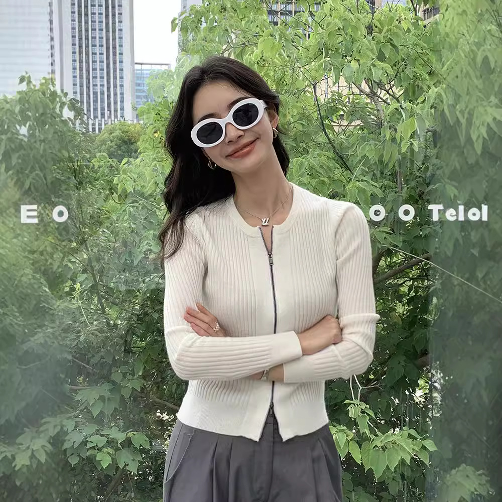 Knitted solid fitted cardigan with a round collar, woolen jacket with zipper