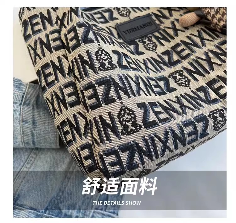 High-end quality niche bag for women 2023 new versatile single-shoulder underarm tote bag, niche hand-carry commuting fabric bag undefined
