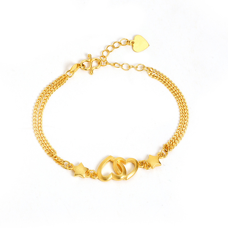 Arena oro pulsera corazón hueco doble corazón desgaste estrella de cinco puntas niñas fresco todo partido simple luz estilo de lujo Yiwu suministro