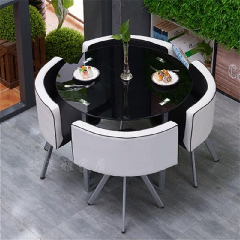 Mesa y sillas de comedor modernas, mesa redonda pequeña de vidrio templado, mesa y sillas para recepción y negociación, una mesa y cuatro sillas, cocina de inducción.