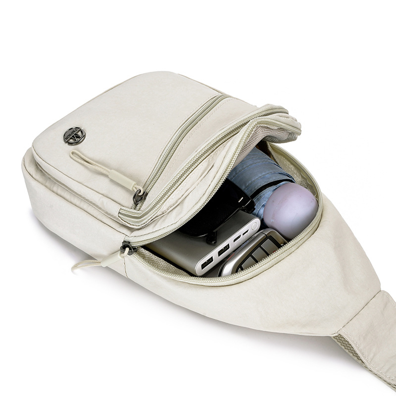Bolso de pecho para mujer de nuevo estilo de comercio exterior Bolso de hombro de nailon de todo fósforo de moda de viaje al aire libre Bolso de mensajero casual simple de color sólido