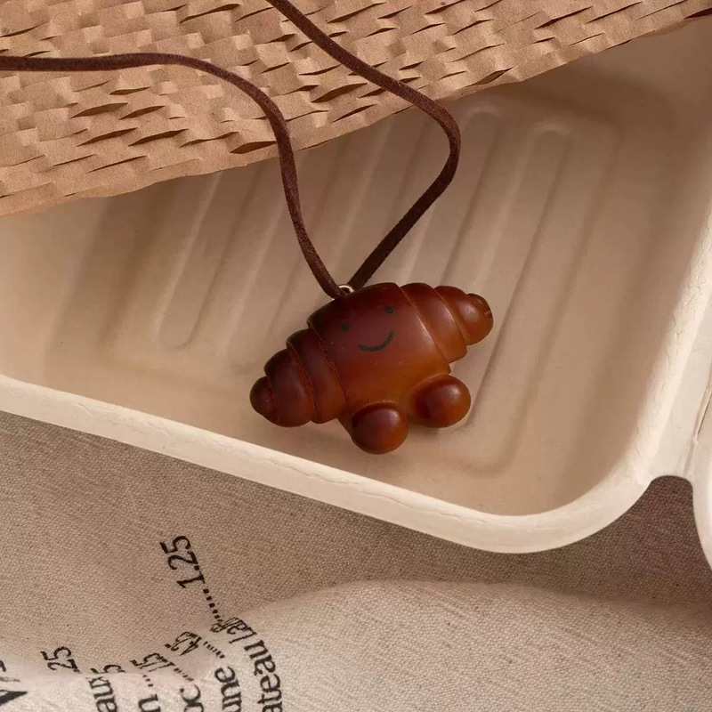 かわいいニッチデザインアルカリ水結びパンペンダントネックレスレディースクロワッサンロングセーターチェーンアクセサリースウェットシャツチェーン|undefined