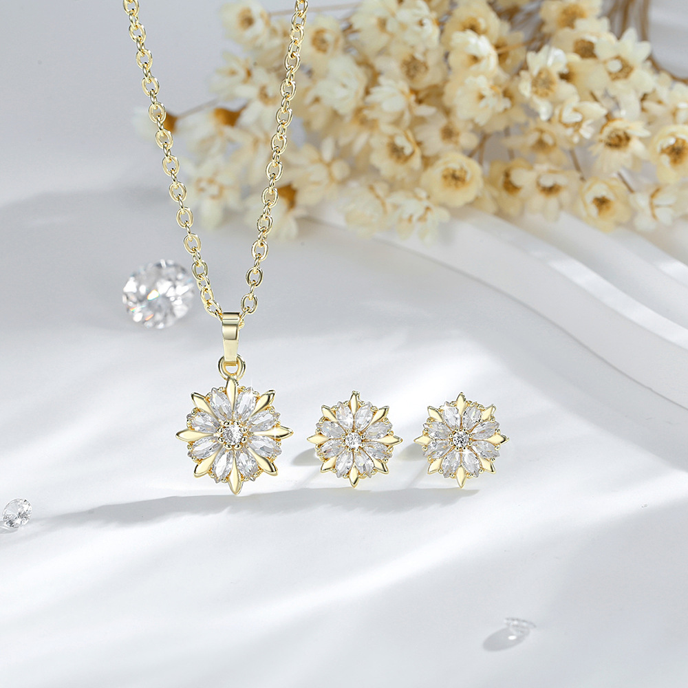 Ventas transfronterizas de flores colgante conjunto de joyería de moda damas collares de zircon orejetas de cobre chapado en oro joyería en forma de O