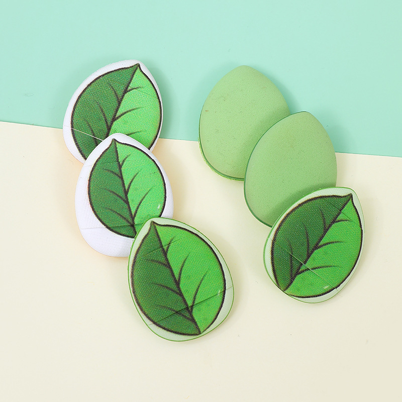 Fábrica personalizada impresión de hojas de dedo polvo no comer polvo de polvo de dedo de maquillaje esponja almohadilla seca y húmeda