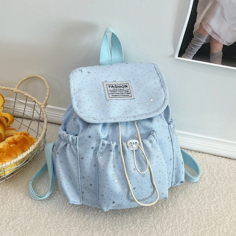Primavera nuevo estilo ins leche de viento bonito joven estrella impresa mochila de hombro para mujeres de alto valor dulce mochila pequeña