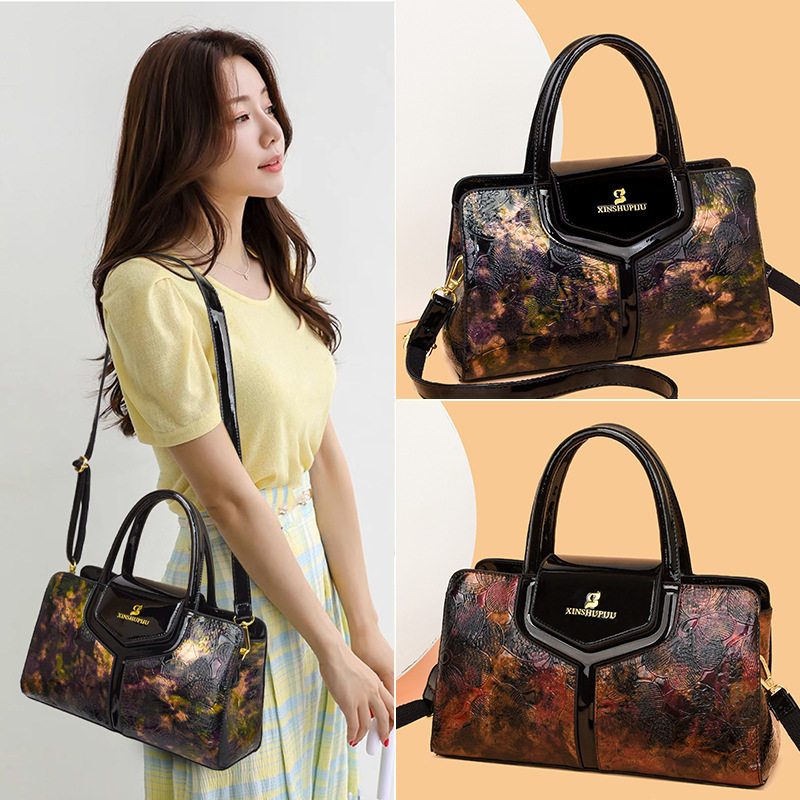 Bolso de hombro transfronterizo de moda de mujer, bolso de mano casual versátil, gran capacidad, sensación de alto nivel, bolso de mochila de estilo europeo y americano.