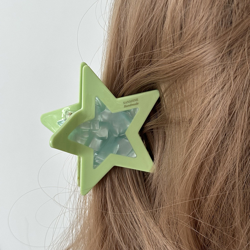 Gouden haarklem met ster design elegante haarclip voor dames_voghion.com