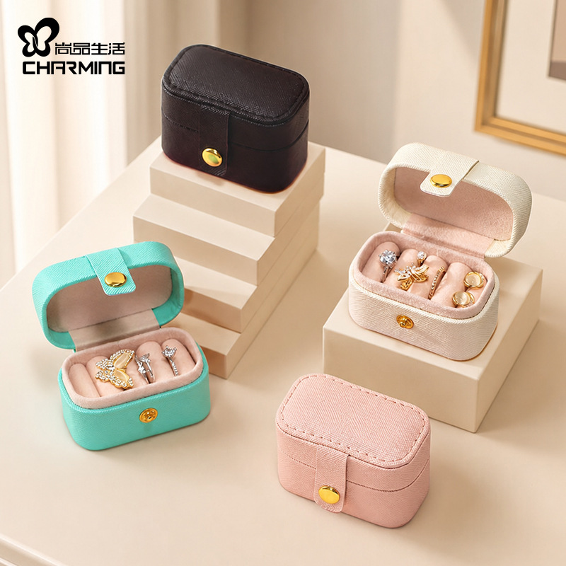 Caja de almacenamiento de joyas pequeña y portátil para anillos, aretes y otras joyas, suministro directo transfronterizo.