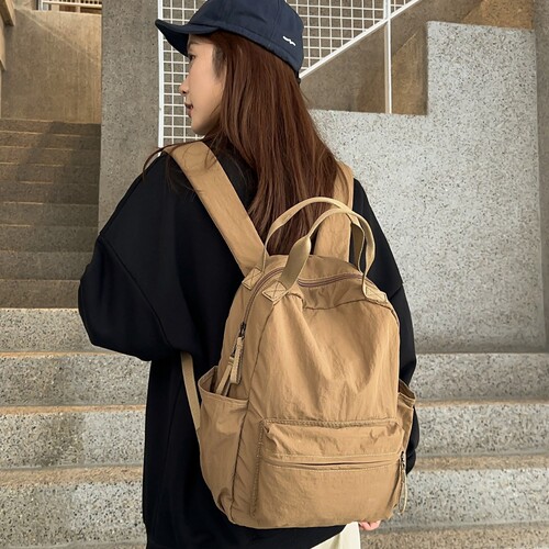 Korean simple all-matching backpack, female college student schoolbag, light commuting computer bag, female traveling backpack