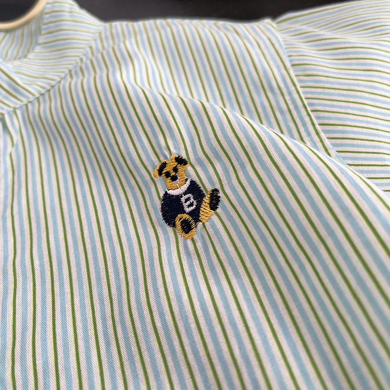 Camisa para niños primavera y otoño 2025 nuevo estilo a rayas para niños chaqueta de punto de manga larga Baita para niños con sal de otoño