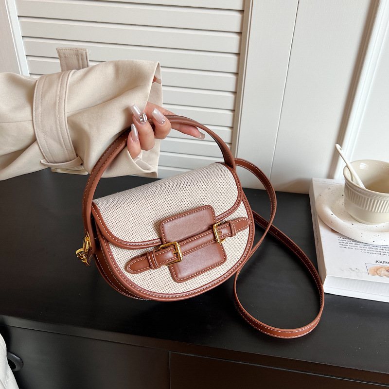 Bags for women 2024 cross border trend new canvas contrast color hand held saddle bag niche high end shoulder messenger bag_voghion.com