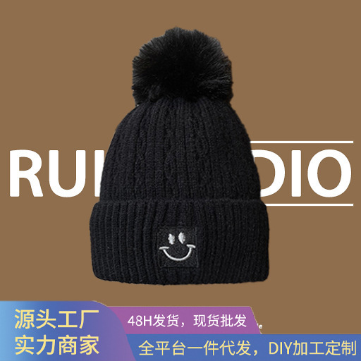 帽子女冬季新款针织帽可爱笑脸保暖帽护耳加绒毛球毛线帽批发