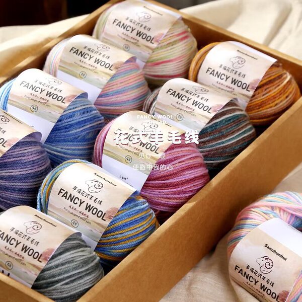 Rainbow woolen ball of yarn