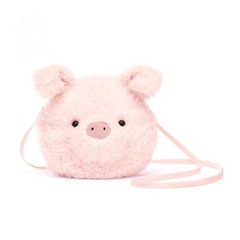 Jc家のかわいいピンクの豚が豚のかわいいぬいぐるみを包んでいます。