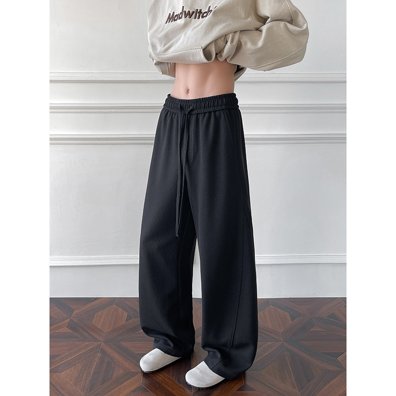 Pantaloni della tuta in stile americano con taglio obliquo e orlo curvo per uomo e donna, primavera, pesanti, vestibilità pulita, vestibilità ampia e casual di alta qualità._voghion.com