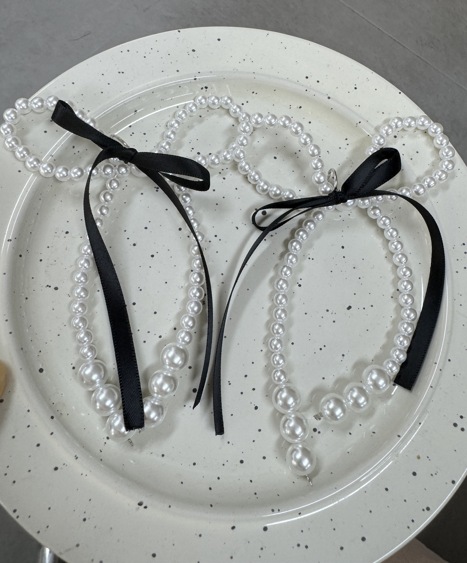 Arco de moda extranjera perla bordilla taconera zapatos botones accesorios colgante de cuentas botones de decoración