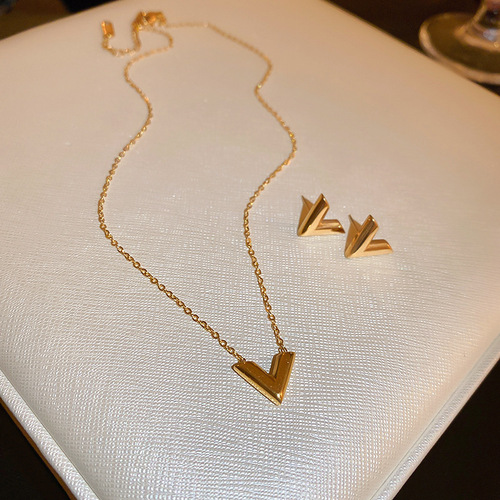 Gold titanium steel V-shaped earrings and necklace set, fashionable, simple and versatile metal style earrings, personalized design jewelry